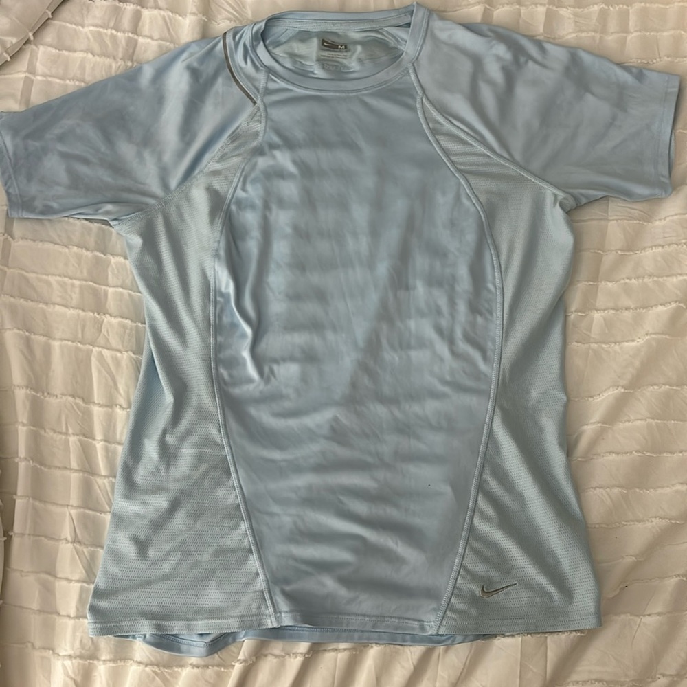 medium light blue Nike dry fit shirt